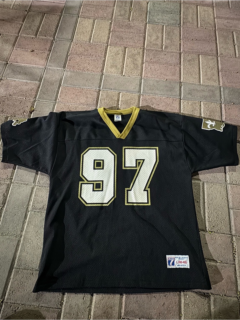 Vintage 1990s New Orleans Saints jersey manufactured by Logo 7